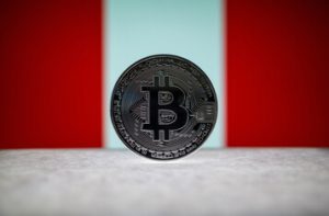Physical20silver20version20of20Bitcoin20BTC20and20Peru20Flag20on20the20background.jpg