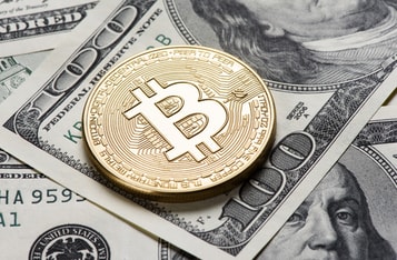 golden20bitcoin20coin20on20us20dollars-min.jpg